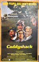Caddyshack movie poster signed by Chevy Chase, approximately 35-1/2 x 22-1/2 inches.  Includes Superstar Greetings COA & photo of Chevy at signing.