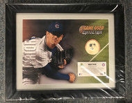 Upper Deck has specially designed this "MLB Game-Used Collection" keepsake, which includes an action photo of Mark Prior coupled with a piece of a game-used baseball (approximately 2'' in diameter) used during an official Chicago Cubs MLB game.