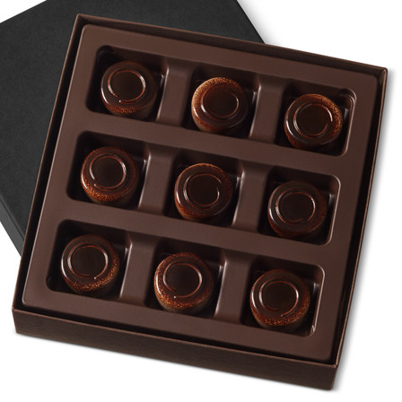 Smooth dark chocolate coffee ganache comes together with a layer of creamy mascarpone in a dark chocolate shell in a nine piece gift box.