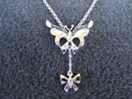 Butterfly and bow necklace 