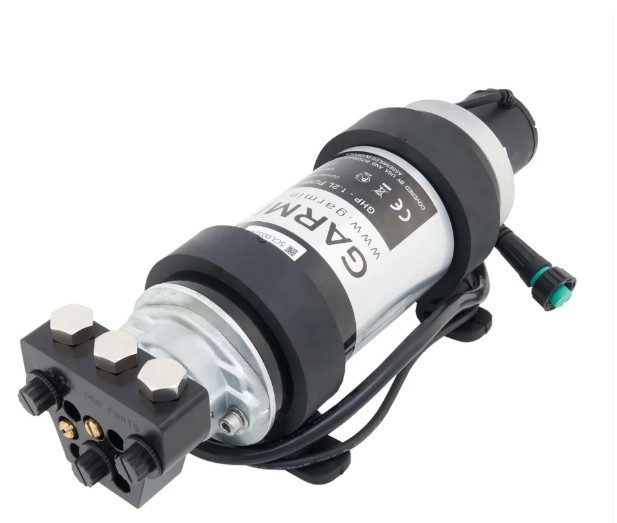 Installation-focused image showing the pump mounted in a marine autopilot system setup.