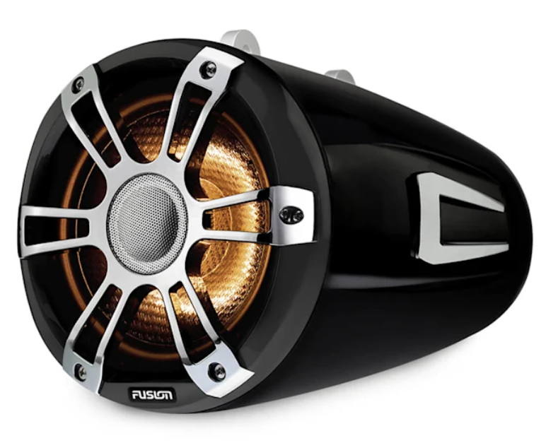 Speaker positioned on a watersports boat wake tower at sunset.