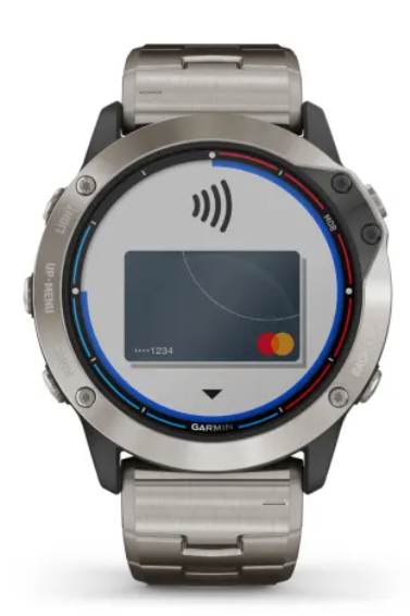 Watch paired with smartphone displaying Garmin Connect app metrics.