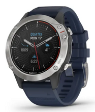 Front view of the Garmin quatix® 6 marine GPS smartwatch in grey with Captain Blue band.
