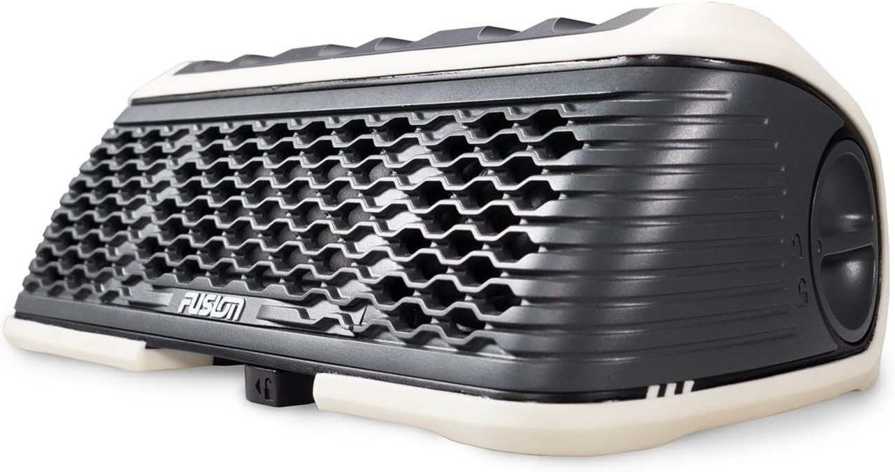 White FUSION StereoActive used outdoors near the water for portable marine audio entertainment.