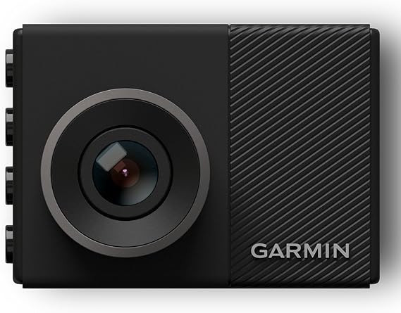 Complete Garmin Dash Cam 45 package with camera, magnetic mount, cables, microSD card, and manual.