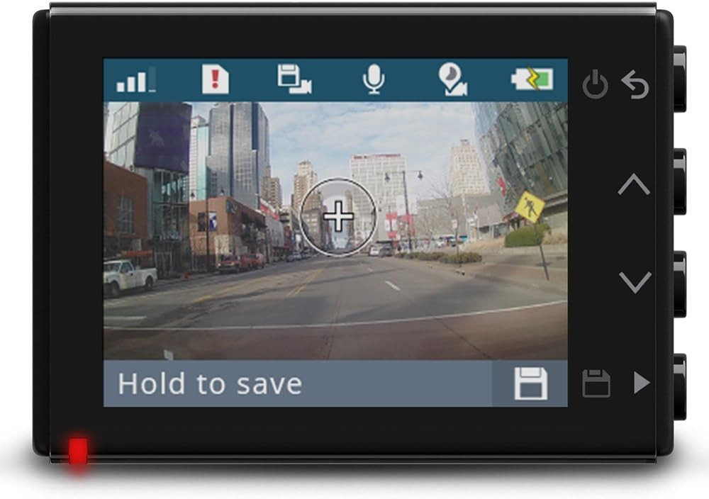 Garmin dashboard camera connected to a vehicle power source for continuous driving recording.