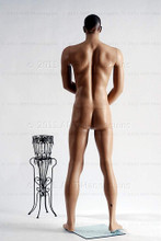 In this full body side view photo, naked mannequin Bill, stands with his legs even, his arms raised to his waist with his left hand almost touching his right arm.  Mannequin Bill can be displayed with or without a wig / hairpiece.  Glass stand and support hardware included.