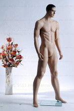 In this full body side view photo, mannequin Matt stands with his legs apart in an even stance, with both hands almost straight down at hip level.  Mannequin Matt can be displayed with or without a wig / hairpiece.  Glass stand and support hardware included.