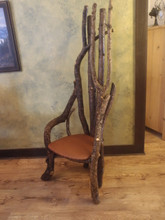 Leather upholstered log chair 