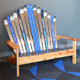 A classic Adirondack bench perfect color coordinated for an office entry area. Shown with varnished redwood.