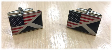 The flags of The USA and Scotland combined on a cufflink.