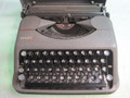 Vintage Hermes "Baby" Manual Portable Typewriter with Hard Cover