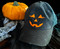 Jack-o-lantern with eyelashes pumpkin cap