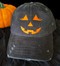 Jack-o-lantern with eyelashes pumpkin cap