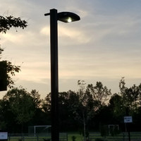LED Area fixture mounted on 15' square straight steel light pole for walkway