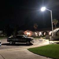 LED Cobrahead light fixtures and round tapered aluminum light poles for roadway in Modesto, CA.