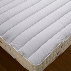 Mattress Protector helps you feel warmer in bed. Elastic corner straps keep it positioned on your mattress.
