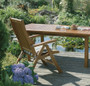 Osmo Decking Oil - Teak Clear finish (007) on wooden garden furniture.