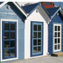 Wooden Summer House painted in Blue and White Osmo Country Colour.