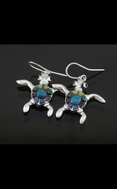 Collectible handmade silver turtle earrings with Serpentine, Chrysocolla, Turquoise, Onyx and purple Spondylus Shell inlay on a white background.