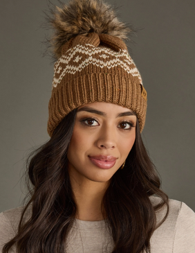 brown and speckled pom hat