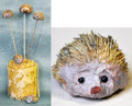 66440 Hedgehogs (On a Stick)  Box of 1 dz.
Box of 12 little Hedgehogs (about 1" - 1-1/2").  They come on a thin bamboo stick and can be easily popped off in you don't want the stick.