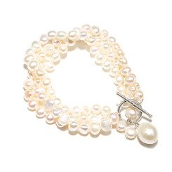 Cream multi-strand baroque pearl bracelet