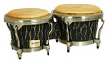 Original Series 7 & 8-1/2 inch. Master Hand-Crafted Bongos. Tycoon. General Merchandise. Hal Leonard #TBHC800BC S. Published by Hal Leonard.

The top choice of Tycoon Percussion artists, the Master Handcrafted Series Bongos are constructed of carefully selected aged Siam Oak with 7″ & 8.5″ water buffalo skin heads for rich bass tones and crisp highs. Each drum is hand carved by a master craftsman resulting in deep textured patterns, where no two drums are ever exactly the same. Their wide tuning range is perfect for live or studio use. Bongo stands and bags are available as an additional option.