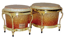 Platinum Sunrise Fade Series 7 & 8-1/2 inch. Master Bongos. Tycoon. General Merchandise. Hal Leonard #TBP800GPF3 S. Published by Hal Leonard.

Special care is undertaken in the production of each drum to ensure that the tiny specks of shiny grain create a luminous, sparkling finish. Tycoon Master “Platinum Sunrise Fade” Series drums feature heavy duty deluxe rims and 3/8″ diameter tuning lugs and feature premium quality water buffalo skin heads that produce the richest bass tones and crisp, clear high pitched slap tones.