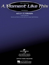 A Moment Like This by Kelly Clarkson. For Piano/Vocal/Guitar. Piano Vocal. Pop and TV. Difficulty: medium. Single. Vocal melody, piano accompaniment, lyrics, chord names and guitar chord diagrams. 9 pages. Published by Hal Leonard.

Sheet music from the winner of American Idol.