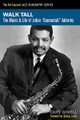 Walk Tall. (The Music and Life of Julian Cannonball Adderley). Book. Softcover. 190 pages. Published by Hal Leonard.

Cannonball Adderley introduces his 1967 recording of “Walk Tall,” by saying, “There are times when things don't lay the way they're supposed to lay. But regardless, you're supposed to hold your head up high and walk tall.” This sums up the life of Julian “Cannonball” Adderley, a man who used a gargantuan technique on the alto saxophone, pride in heritage, devotion to educating youngsters, and insatiable musical curiosity to bridge gaps between jazz and popular music in the 1960s and '70s. His career began in 1955 with a Cinderella-like cameo in a New York nightclub, resulting in the jazz world's looking to him as “the New Bird,” the successor to the late Charlie Parker. But Adderley refused to be typecast. His work with Miles Davis on the landmark Kind of Blue album helped further his reputation as a unique stylist, but Adderley's greatest fame came with his own quintet's breakthrough engagement at San Francisco's Jazz Workshop in 1959, which launched the popularization of soul jazz in the 1960s. With his loyal brother Nat by his side, along with stellar sidemen, such as keyboardist Joe Zawinul, Adderley used an engaging, erudite personality as only Duke Ellington had done before him. All this and more are captured in this engaging read by author Cary Ginell.