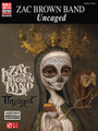 Zac Brown Band - Uncaged by Zac Brown Band. For Guitar. Play It Like It Is. Softcover. Guitar tablature. 108 pages. Published by Cherry Lane Music.

Zac Brown calls the band's 2012 album, “Your basic country-Southern rock-bluegrass-reggae-jam record.” Here are artist-approved, note-for-note guitar transcriptions of all 11 danceable tracks from this chart-topper, including the hit singles “Day That I Die,” “Goodbye in Her Eyes” and “The Wind.” Includes a bio of the band/notes on the making of the album.