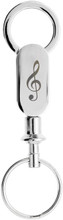 Keychain with a pull-apart G-Clef, silver engraved.
