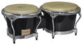 Master Series Black Finish Bongos (7 inch & 8-1/2 inch). For Bongos. Tycoon. Tycoon Percussion #TB-800CBK. Published by Tycoon Percussion.

Constructed of hand-selected, aged Siam Oak wood, these bongos feature Chrome Deluxe hoops and large 5/16″ diameter tuning lugs. Numerous layers of super high-gloss are applied and polished to create an attractive mirror-like exterior coat. The bongos feature premium quality water buffalo skin heads, and a tuning wrench is included.