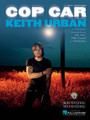 Cop Car by Keith Urban. For Piano/Vocal/Guitar. Piano Vocal. 12 pages.

This sheet music features an arrangement for piano and voice with guitar chord frames, with the melody presented in the right hand of the piano part as well as in the vocal line.
