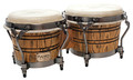 Signature Grand Series Bongos (7 & 8-12 inch.). For Bongos. Tycoon. Tycoon Percussion #TSBG-800BC. Published by Tycoon Percussion.

Equipped with genuine calf skin heads, these drums are perfect for any style of music and are excellent for both studio recordings and live playing. Constructed of hand-selected, top-grade American Ash wood, and featuring brushed-chrome Classic Pro hoops and large 5/16″ diameter tuning lugs, these bongos have a natural matte finish. Special procedures are taken in the production process to accentuate patterns of the wood grain. Tuning wrench included.