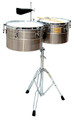 Deep-Shell Brushed Chrome Finish Timbales (14 inch. & 15 inch.). For Timbales. Tycoon. Tycoon Percussion #TTI/L-1415BC. Published by Tycoon Percussion.

Designed for the professional or advanced player, these timbales offer superior quality and authenticity in sound. The 14″ and 15″ diameter brushed chrome plated 8-1/2″ deep shells are made from stainless steel and can be tuned with the included tuning wrench. Also included are a heavy-duty, fully height-adjustable, tilting timbale stand, cowbell mounting bracket with Tycoon TW-60 cowbell, and a pair of timbale sticks.