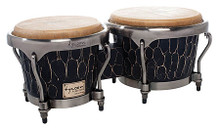 Master Hand-Crafted Original Series Bongos (7 inch. & 8-1/2 inch.). For Bongos. Tycoon. Tycoon Percussion #TBHC-800BC. Published by Tycoon Percussion.

As the name suggests, these drums are hand-carved by highly-skilled craftsmen, resulting in their unique and beautiful appearance. No two drums will look exactly the same! Constructed of hand-selected, aged Siam Oak wood, the bongos feature brushed chrome Deluxe hoops and large 5/16″ diameter tuning lugs. The skin heads are premium quality water buffalo, and a tuning wrench is included.
