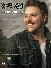 Who I Am with You by Chris Young. For Piano/Vocal/Guitar. Piano Vocal. 8 pages. Published by Hal Leonard.

This sheet music features an arrangement for piano and voice with guitar chord frames, with the melody presented in the right hand of the piano part as well as in the vocal line.