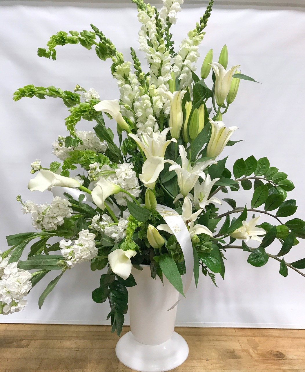 Contemporary White Urn Arrangement Wedel's Garden Center