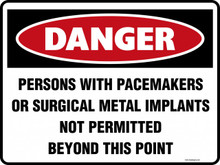 DANGER - PERSONS WITH PACEMAKERS OR SURGICAL METAL IMPLANTS NOT PERMITTED BEYOND THIS POINT