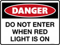 DANGER - DO NOT ENTER WHEN RED LIGHT IS ON