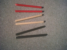 Colored wood dowels for steel drum mallets.
