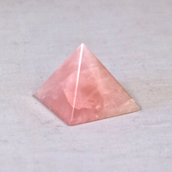 Rose Quartz is said to have a calming energy and to provide peacefulness and restore harmony.


Rose Quartz Pyramid - base is approx. 1 5/16 inches and height is approx. 1 1/4 inches.  Weight is .08 lbs or 1.28 oz.  The Rose Quartz Pyramid pictured is the one you will be receiving upon purchase of this item.
