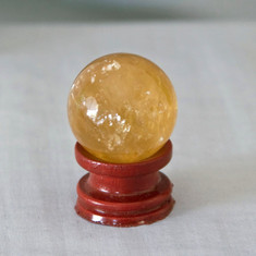 Honey Calcite is said to have Power and Healing energies and to be excellent for meditation.


Calcite Sphere - Golden Honey color.  Weight is .14 lbs or 2.24 oz., sphere is approx. 35 mm.  The Calcite Sphere pictured is the one that you will be receiving upon purchase of this item.  Stand is not included.