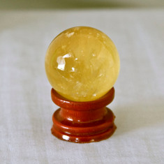 Honey Calcite is said to have Power and Healing energies and to be excellent for meditation.


Calcite Sphere - Golden Honey color.  Weight is .14 lbs or 2.24 oz., sphere is approx. 37 mm.  The Calcite Sphere pictured is the one that you will be receiving upon purchase of this item.  Stand is not included.