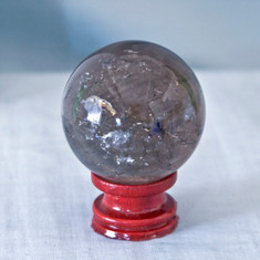 Smokey Quartz is a protection stone that clears negative energy.  It is also known to enhances organizational skills.


Smokey Quartz Sphere - approx. 55 mm.  Weight is .44 lbs or 7.04 oz.  The Smokey Quartz Sphere pictured is the one you will be receiving upon purchase of this item.  Stand is not included.