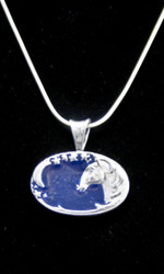 This Sterling Silver pendant features a horse head with a sliver of a moon and a trail of stars.  The dark blue enamel overlay gives depth.  Comes with a 20 inch  Sterling Silver snake chain.  Also see the match bracelet to create a beautiful gift set.
