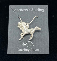 This Prancing Beauty has a beautiful flowing mane and tail and is made of Sterling Silver and comes with a 18 inch Sterling Silver snake chain. Horse pendant is 1.25 inches long and 1 inch tall.